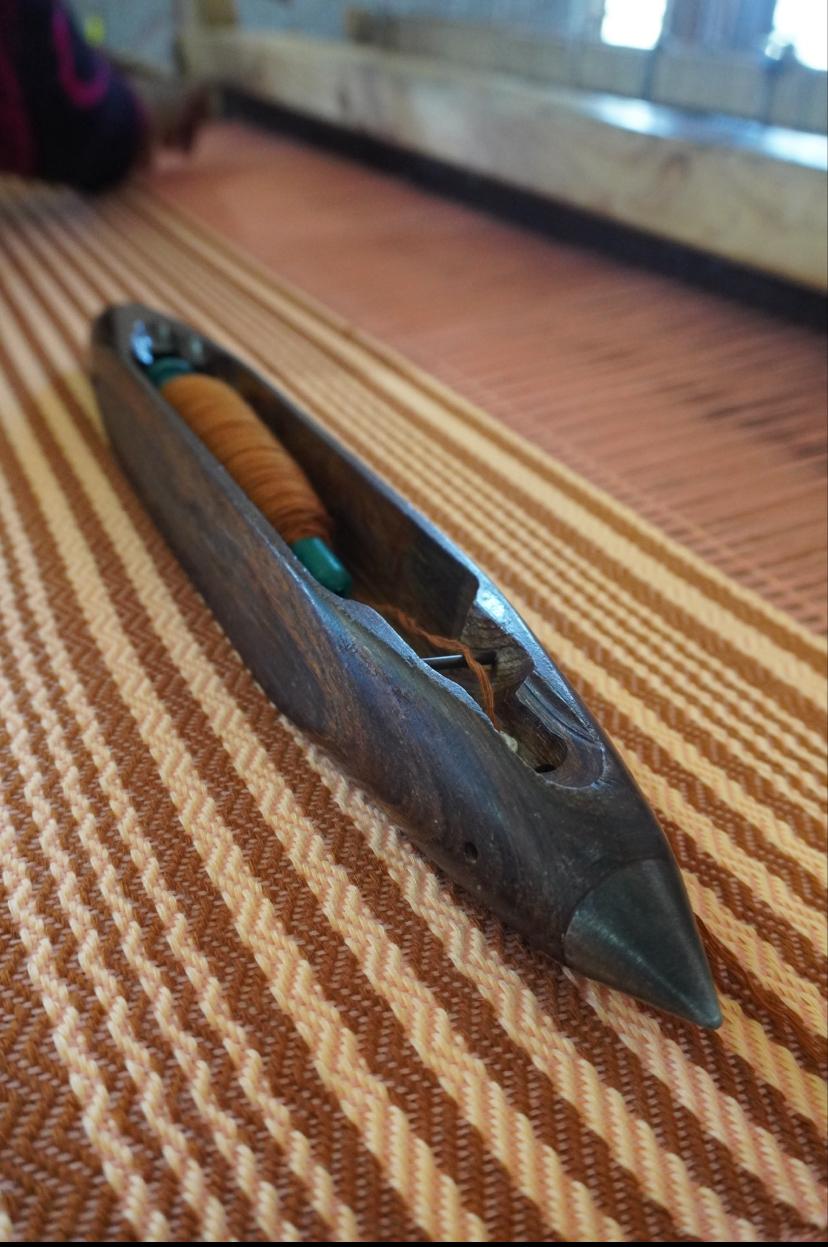 Wooden shuttle